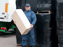 Sawdust bales are a convenient shape, size and weight making them easy to handle and pour. 