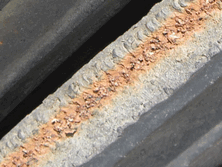 An example of a tyre wall after 3 years use on an outside silage clamp. Exposed cut ends of wires have mostly rusted down to dust. Eventually the edges become relatively smooth with no wires exposed